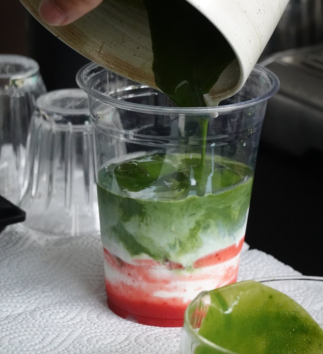 The pet-friendly home cafe’s popular Strawberry Matcha (top) and Spicy Chicken Focaccia