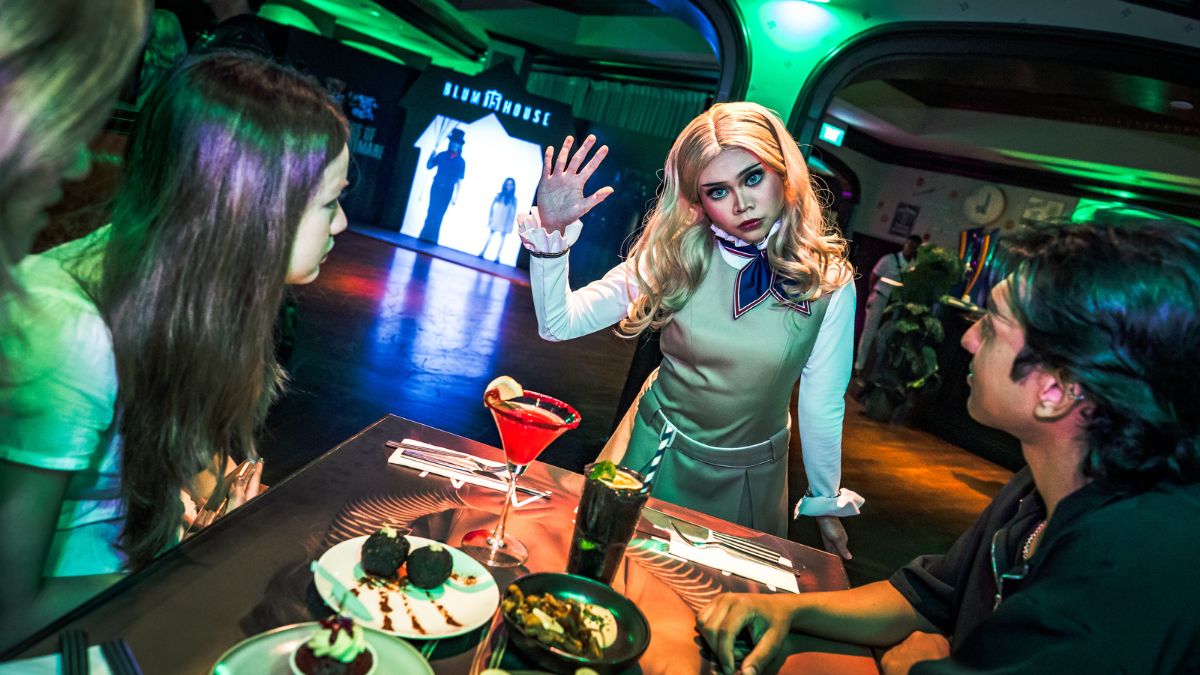Diners visited by horror icon Megan at Blumhouse bar.
